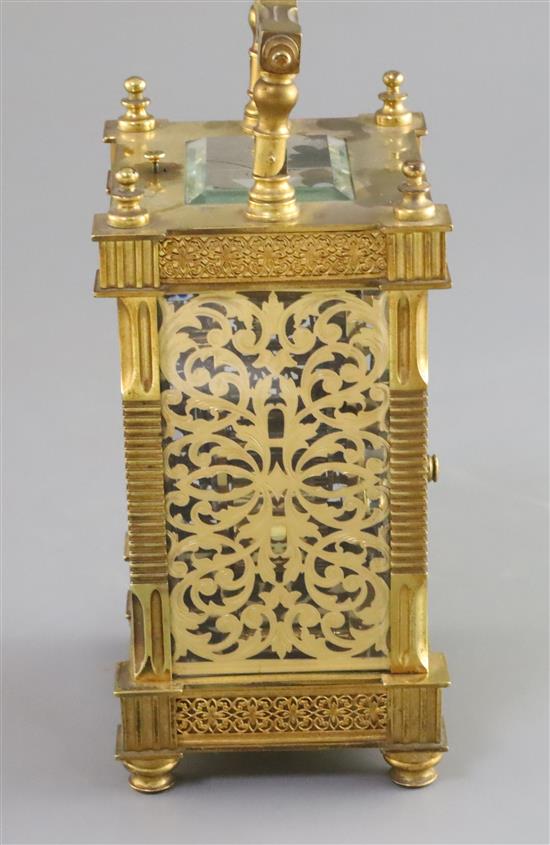 An early 20th century French ormolu hour repeating carriage clock, 6.5in., with red leather travelling case